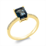 Ring 18 kt GG, 8 Brill. 0,04 ct, TW-si, 12 Brill. 0,03 ct, TW-si, 1 Topas 1,89 ct Lond. blue
