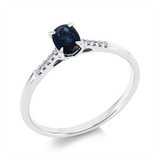 Ring 18 kt WG, 10 Brill. 0,03 ct, TW-si, 1 Saphir 0,59 ct blau
