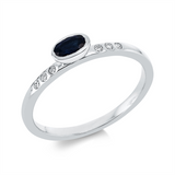 Ring 18 kt WG, 6 Brill. 0,06 ct, TW-si, 1 Saphir 0,31 ct blau