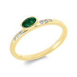 Ring 18 kt GG, 6 Brill. 0,06 ct, TW-si, 1 Smaragd 0,31 ct grün