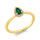 Ring 18 kt GG, 15 Brill. 0,06 ct, TW-si, 1 Smaragd 0,20 ct grün
