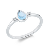 Ring 18 kt WG, 2 Brill. 0,03 ct, TW-si, 1 Topas 0,39 ct sky blue
