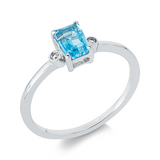 Ring 18 kt WG, 2 Brill. 0,02 ct, TW-si, 1 Topas 0,78 ct blau