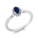 Ring 18 kt WG, 16 Brill. 0,06 ct, TW-si, 1 Saphir 0,28 ct blau