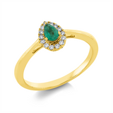 Ring 18 kt GG, 14 Brill. 0,09 ct, TW-si, 1 Smaragd 0,19 ct grün