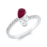 Ring 18 kt WG, 15 Fant-Schl. 0,53 ct, TW-si, 1 Rubin 0,56 ct rot