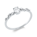Ring 18 kt WG, 1 Oval 0,25 ct, TW-si, 8 Brill. 0,08 ct, TW-si