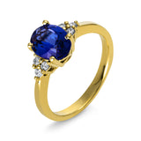 Ring 14 kt GG, 6 Brill. 0,21 ct, TW-si, 1 Tansanit 1,95 ct blau