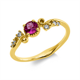 Ring 18 kt GG, 6 Brill. 0,08 ct, TW-si/pi, 1 Rubin 0,25 ct rot