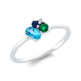 Ring 18KW, 1 Brill. 0,01 ct, TW-si, 1 Smaragd 0,10 ct grün, 2 Saphire 0,05 ct blau, 1 Topas 0,31 ct blau