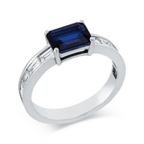 Ring 18 kt WG, 10 Bag. 0,79 ct, F-vsi, 1 Saphir 1,36 ct blau