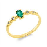 Ring 18 kt GG, 2 Brill. 0,03 ct, TW-si, 2 Brill. 0,02 ct, TW-si, 1 Smaragd 0,22 ct grün