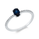 Ring 18 kt WG, 18 Brill. 0,09 ct, TW-si, 1 Saphir 0,52 ct blau