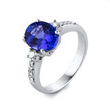 Ring 18 kt WG, 10 Brill. 0,19 ct, TW-si, 1 Tansanit 2,47 ct blau