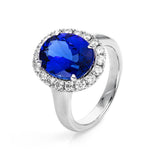 Ring 18 kt WG, 18 Brill. 0,81 ct, TW-si, 1 Tansanit 5,70 ct blau