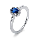 Ring 18 kt WG, 18 Brill. 0,08 ct, TW-si, 1 Saphir 0,63 ct blau