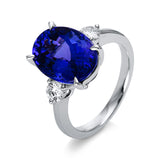 Ring 18 kt WG, 2 Brill. 0,37 ct, TW-si, 1 Tansanit 9,10 ct blau