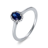 Ring 18 kt WG, 16 Brill. 0,08 ct, TW-si, 1 Saphir 0,54 ct blau