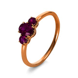 Ring 18 kt RG, 1 Rubin 0,53 ct rot, 2 Rubine 0,26 ct rot