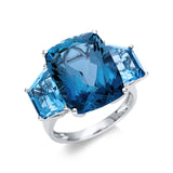 Ring 18 kt WG, 1 Blautopas 13,80 ct Lond. blue, 2 Blautopase 4,70 ct blau