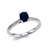 Ring 18 kt WG, 16 Brill. 0,17 ct, TW-vsi, 1 Saphir 0,95 ct blau