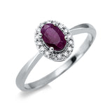 Ring 18 kt WG, 16 Brill. 0,10 ct, TW-si, 1 Rubin 0,59 ct rot