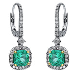 Ohrschmuck 18 kt WG+GG, 56 Brill. 0,67 ct, TW-si, 2 Smaragde 1,66 ct grün