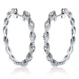 Creolen 18 kt WG, 12 Brill. 0,38 ct, TW-si, 24 Brill. 0,10 ct, TW-si