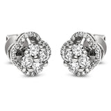 Ohrstecker 18 kt WG, 8 Brill. 0,54 ct, TW-vsi, 48 Brill. 0,14 ct, TW-vsi