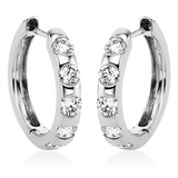 Creolen 18 kt WG, 10 Brill. 0,71 ct, TW-si