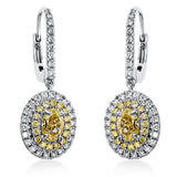Ohrschmuck 18 kt WG+GG, 62 Brill. 0,41 ct, TW-si, 2 Oval 1,03 ct, gelb, 32 Brill. 0,19 ct, gelb