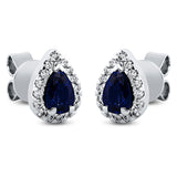 Ohrstecker 18 kt WG, 32 Brill. 0,21 ct, TW-si, 2 Saphire 0,92 ct blau