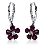 Ohrschmuck 18 kt WG, 22 Brill. 0,33 ct, TW/W-vsi/si, 10 Rubine 2,68 ct rot