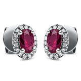 Ohrstecker 18 kt WG, 32 Brill. 0,10 ct, TW-si, 2 Rubine 0,53 ct rot