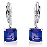 Ohrschmuck 18 kt WG, 18 Brill. 0,06 ct, TW-si, 2 Tansanit 5,31 ct blau