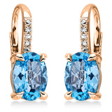 Ohrschmuck 18 kt RG, 4 Dia. 0,01 ct, TW-si, 2 Topase 2,80 ct blau