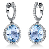 Ohrschmuck 18 kt WG, 72 Brill. 0,32 ct, TW-si, 2 Topase 9,50 ct sky blue