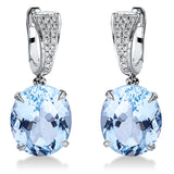 Ohrschmuck 18 kt WG, 34 Brill. 0,17 ct, TW-si, 2 Topase 12,90 ct sky blue