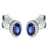 Ohrstecker 18 kt WG, 32 Brill. 0,09 ct, TW-si, 2 Saphire 0,64 ct blau