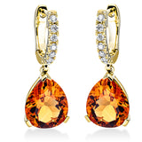 Ohrschmuck 18 kt GG, 14 Brill. 0,22 ct, TW-si, 2 Citrin 5,30 ct mandarin