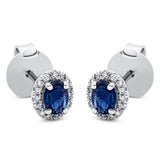 Ohrstecker 18 kt WG, 30 Brill. 0,08 ct, TW-si, 2 Saphire 0,49 ct blau