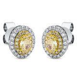 Ohrstecker 18 kt GG+WG, 40 Brill. 0,26 ct, TW-si, 2 Brill. 0,55 ct, gelb, 32 Brill. 0,13 ct, gelb