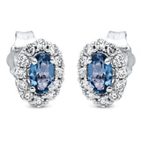 Ohrstecker 18 kt WG, 24 Brill. 0,25 ct, TW-si, 2 Topase 0,56 ct Lond. blue