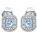 Ohrstecker 18 kt WG, 40 Dia. 0,05 ct, TW-si, 2 Topase 0,30 ct blau