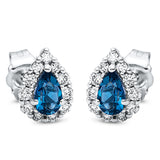 Ohrstecker 18 kt WG, 22 Brill. 0,25 ct, TW-si, 2 Topase 0,50 ct Lond. blue