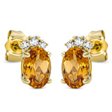 Ohrstecker 18 kt GG, 2 Brill. 0,05 ct, TW-si, 4 Brill. 0,05 ct, TW-si, 2 Citrin 1,34 ct gelb