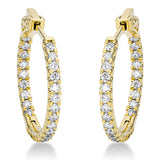 Creolen 18 kt GG, 48 Brill. 0,65 ct, TW-si