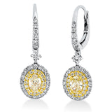 Ohrschmuck 14 kt WG+GG, 54 Brill. 0,64 ct, TW-si, 2 Oval 0,91 ct, gelb, 32 Brill. 0,16 ct, gelb