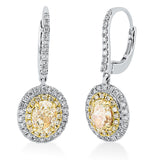 Ohrschmuck 18 kt WG+GG, 62 Brill. 0,40 ct, TW-si, 2 Oval 1,64 ct, gelb, 32 Brill. 0,15 ct, gelb