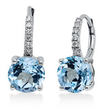 Ohrschmuck 18 kt WG, 12 Brill. 0,15 ct, TW-si, 2 Topase 4,74 ct sky blue
